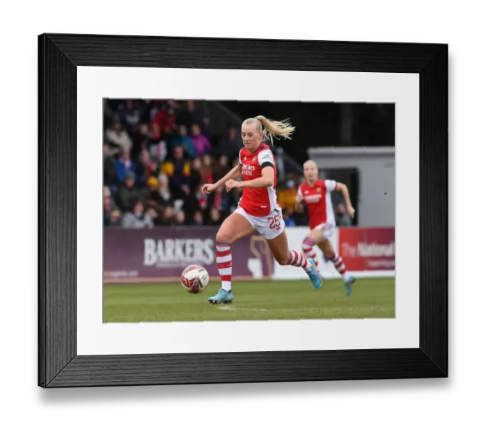 Framed Print : Arsenal's Stina Blackstenius in Action Against Manchester United Women - FA WSL 2021-22: A Clash of Talents
