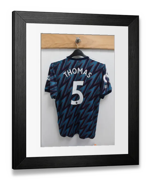 Framed Print : Arsenal: Thomas Partey's Shirt in Arsenal Changing Room Before Wolverhampton Wanderers Clash (Premier League 2021-22)