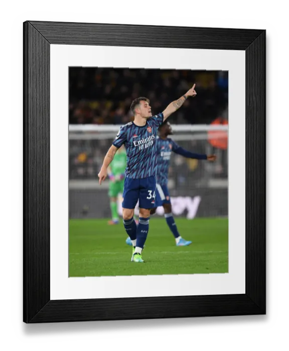 Framed Print : Granit Xhaka: Arsenal's Midfield Mastermind in Action against Wolverhampton Wanderers, Premier League 2021-22