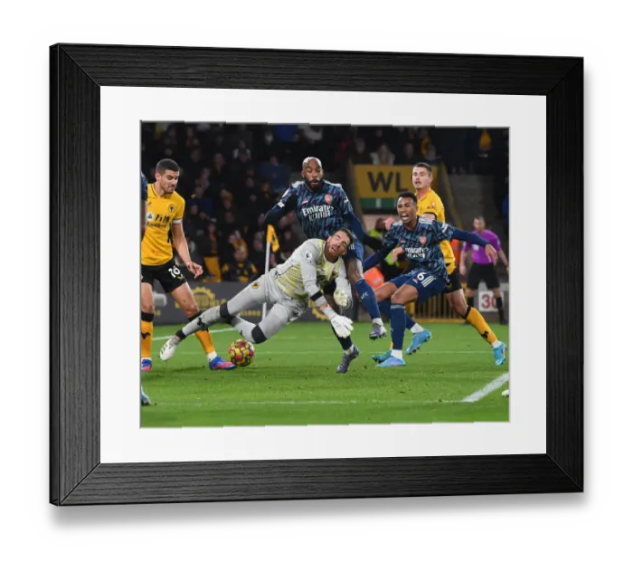 Framed Print : Arsenal's Lacazette Faces Off Against Wolves Sa in Intense Premier League Clash