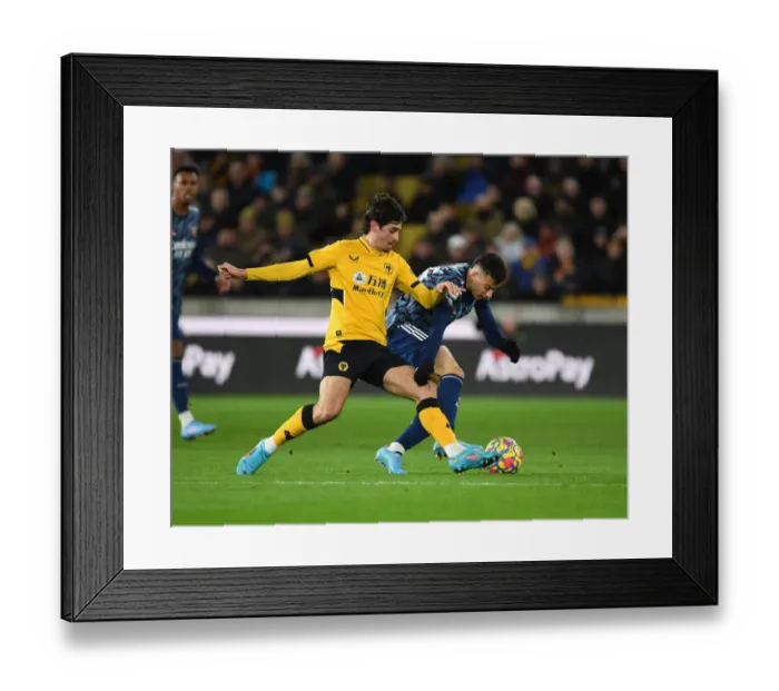 Framed Print : Martinelli vs Trincao: Battle at Molineux - Wolverhampton Wanderers vs Arsenal, Premier League 2021-22