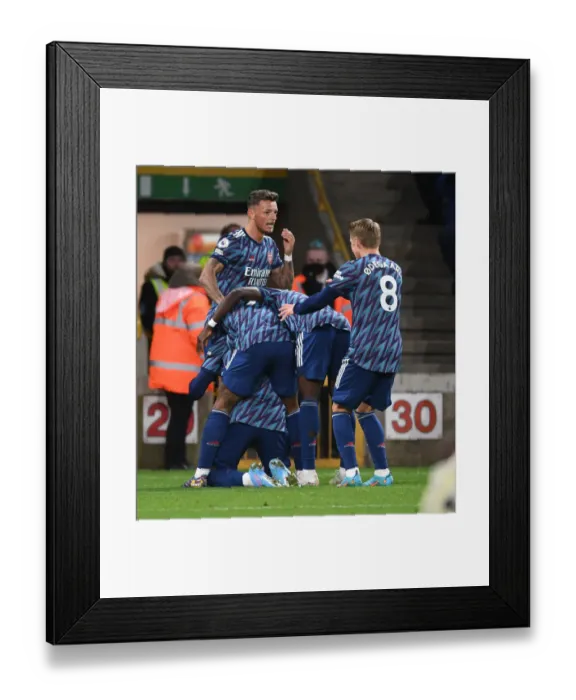 Framed Print : Arsenal Celebrate Gabriel's Goal vs. Wolverhampton Wanderers in Premier League Action Framed Print : Arsenal Celebrate Gabriel's Goal vs. Wolverhampton Wanderers in Premier League Action