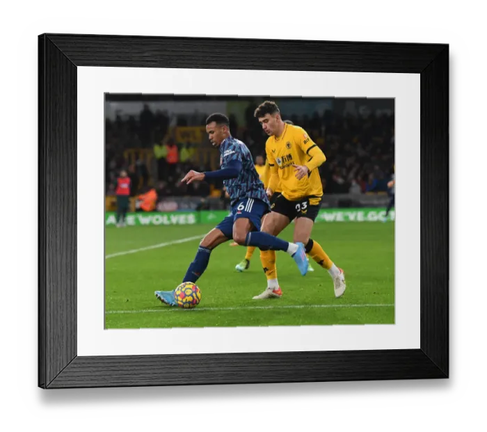 Framed Print : Gabriel vs. Kilman: Intense Battle in Wolverhampton Wanderers vs. Arsenal Premier League Clash Framed Print : Gabriel vs. Kilman: Intense Battle in Wolverhampton Wanderers vs. Arsenal Premier League Clash