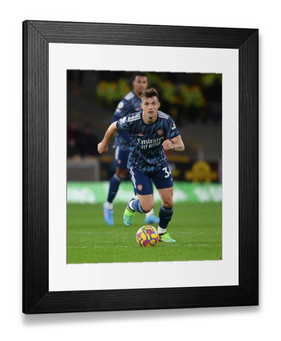Framed Print : Granit Xhaka's Brilliant Midfield Performance: Arsenal Triumph Over Wolverhampton Wanderers Framed Print : Granit Xhaka's Brilliant Midfield Performance: Arsenal Triumph Over Wolverhampton Wanderers
