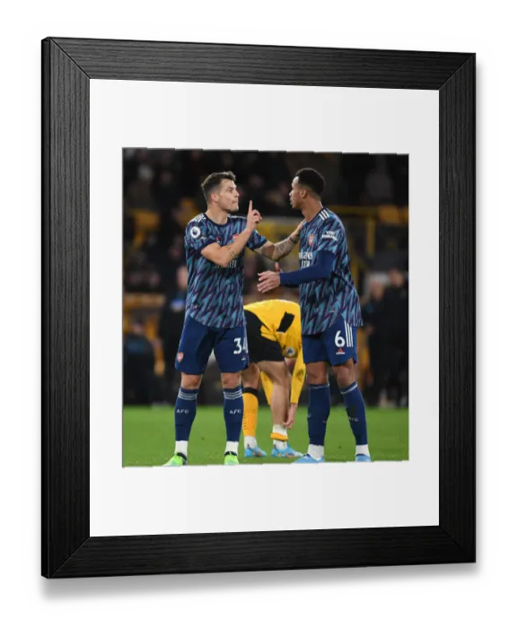 Framed Print : Granit Xhaka and Gabriel: Focused Determination at Molineux - Wolverhampton Wanderers vs Arsenal, Premier League 2021-22