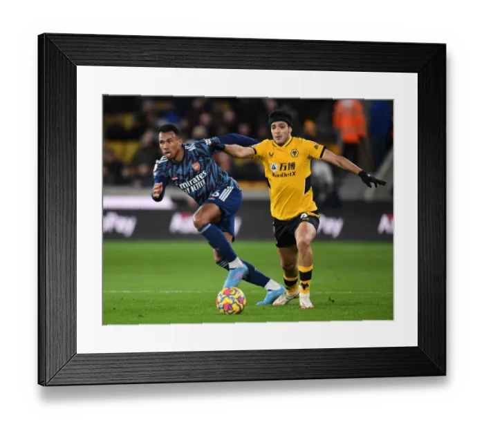 Framed Print : Gabriel vs. Raul Jimenez: Intense Battle at Molineux - Wolverhampton Wanderers vs. Arsenal, Premier League 2021-22 Framed Print : Gabriel vs. Raul Jimenez: Intense Battle at Molineux - Wolverhampton Wanderers vs. Arsenal, Premier League 2021-22