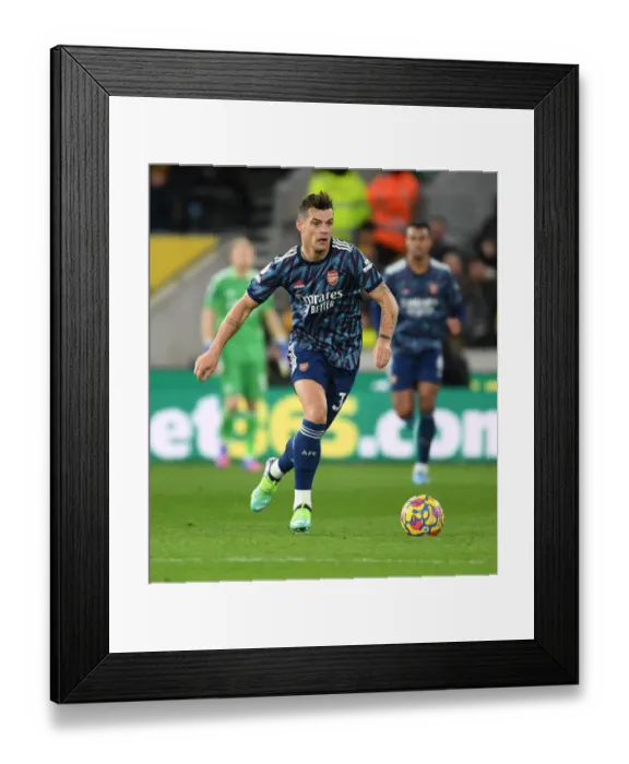Framed Print : Granit Xhaka: In Action for Arsenal Against Wolverhampton Wanderers, Premier League 2021-22
