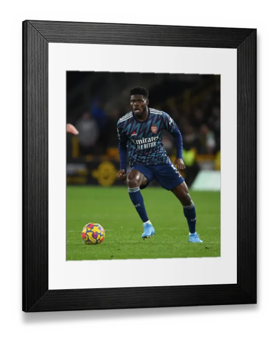 Framed Print : Thomas Partey: Arsenal's Midfield Maestro Shines in Premier League Clash Against Wolverhampton Wanderers