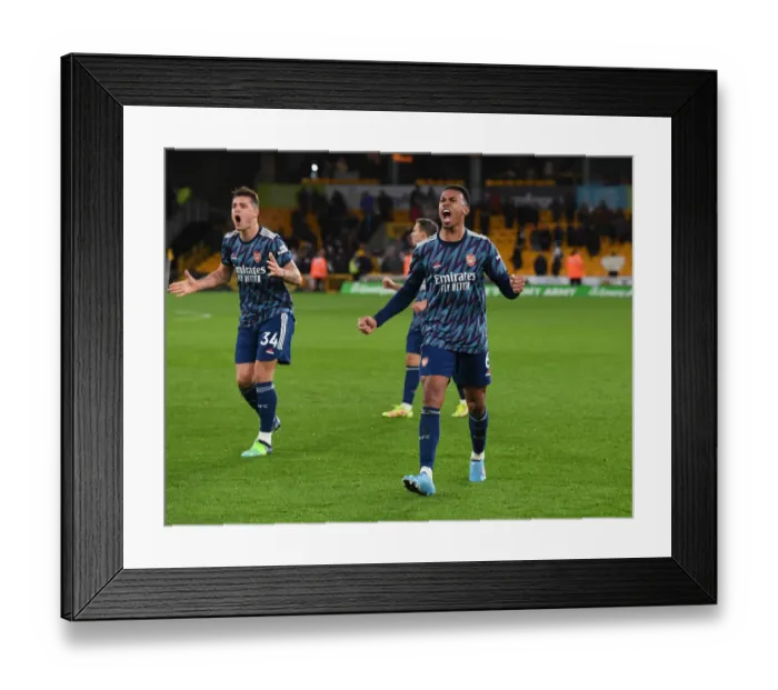 Framed Print : Granit Xhaka and Gabriel's Celebration: Arsenal's Win at Wolverhampton Wanderers in the Premier League Framed Print : Granit Xhaka and Gabriel's Celebration: Arsenal's Win at Wolverhampton Wanderers in the Premier League