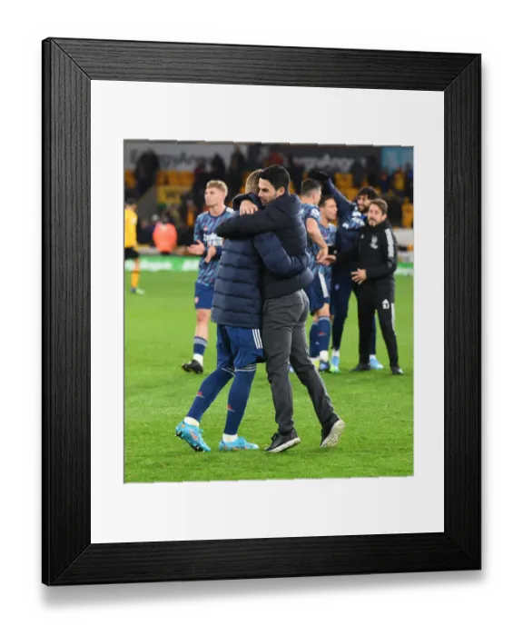 Framed Print : Arteta Embraces Odegaard: Wolverhampton Wanderers vs Arsenal, Premier League 2021-22