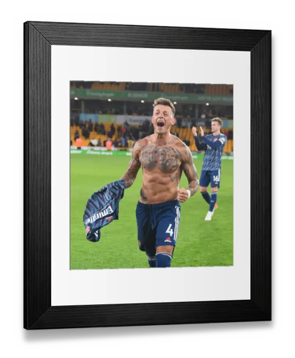 Framed Print : Ben White's Emotional Celebration: Arsenal's Hard-Fought Victory over Wolverhampton Wanderers