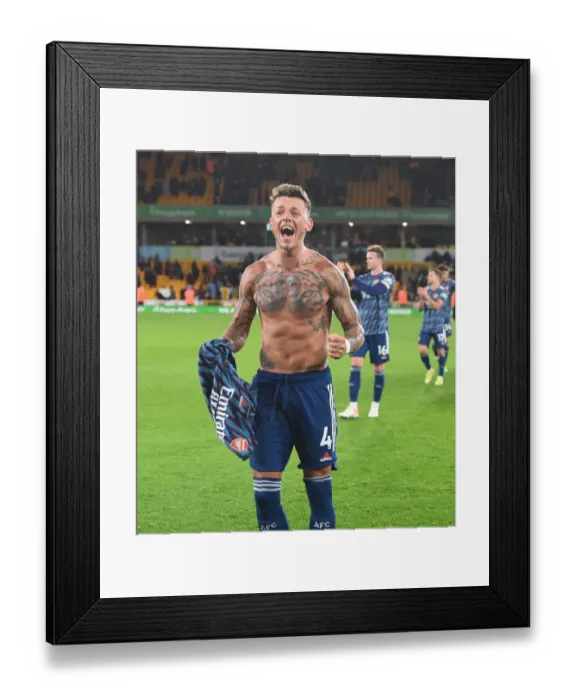 Framed Print : Ben White's Emotional Celebration: Arsenal Secures Hard-Fought Victory Over Wolverhampton Wanderers Framed Print : Ben White's Emotional Celebration: Arsenal Secures Hard-Fought Victory Over Wolverhampton Wanderers