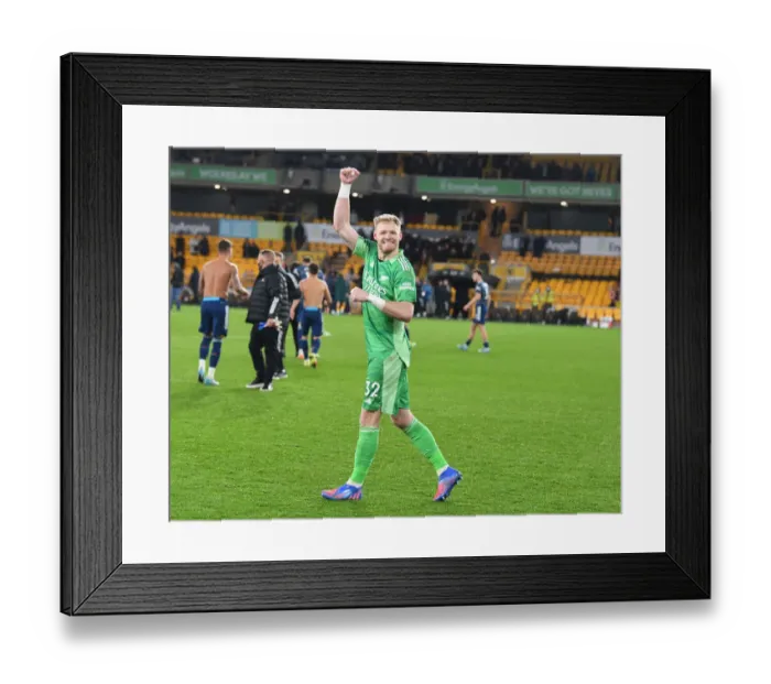 Framed Print : Arsenal's Aaron Ramsdale: Savoring Victory Against Wolverhampton Wanderers in the Premier League