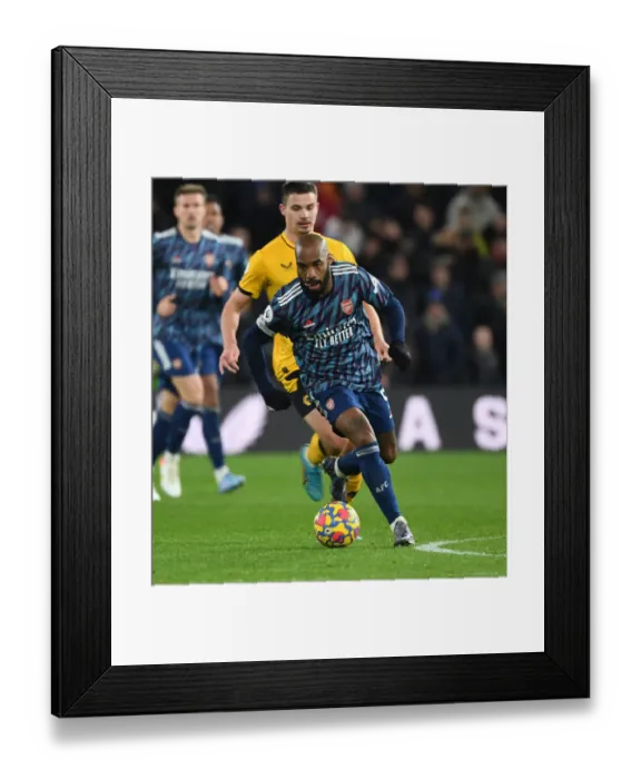 Framed Print : Arsenal's Alex Lacazette in Action Against Wolverhampton Wanderers - Premier League 2021-22 Framed Print : Arsenal's Alex Lacazette in Action Against Wolverhampton Wanderers - Premier League 2021-22