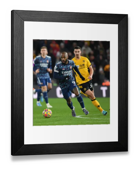 Framed Print : Alex Lacazette in Action: Wolverhampton Wanderers vs Arsenal, Premier League 2021-22