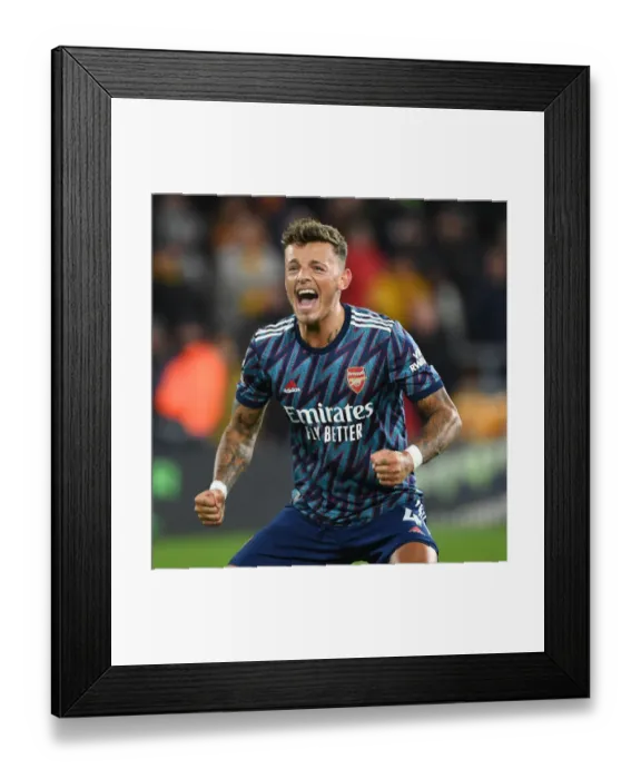 Framed Print : Ben White's Euphoric Moment: Arsenal Secure Hard-Fought Victory Over Wolverhampton Wanderers Framed Print : Ben White's Euphoric Moment: Arsenal Secure Hard-Fought Victory Over Wolverhampton Wanderers