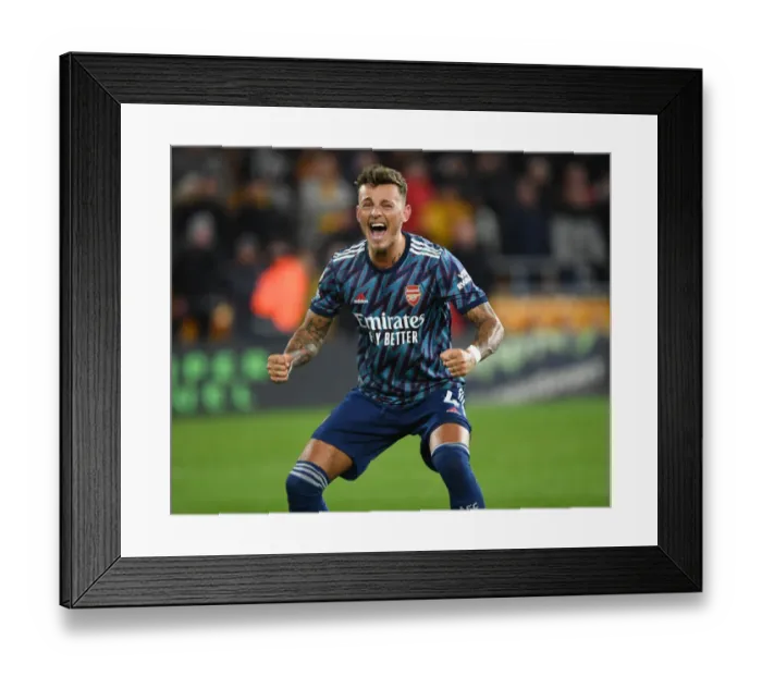 Framed Print : Ben White's Emotional Celebration: Arsenal's Hard-Fought Victory over Wolverhampton Wanderers