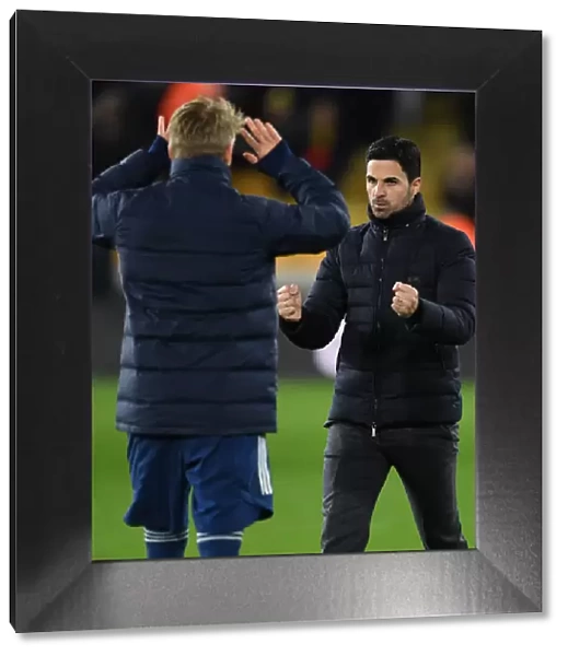 Arsenal Manager Mikel Arteta Celebrates with Martin Odegaard after Wolverhampton Win