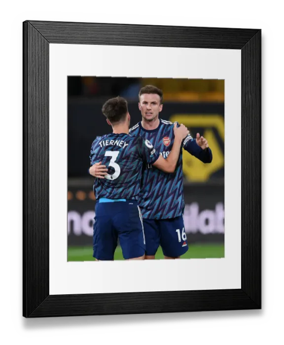 Framed Print : Arsenal's Holding and Tierney Celebrate Victory Over Wolverhampton Wanderers in Premier League