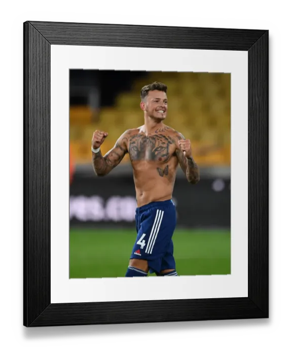 Framed Print : Ben White's Celebration: Arsenal Secures Win Against Wolverhampton Wanderers in Premier League