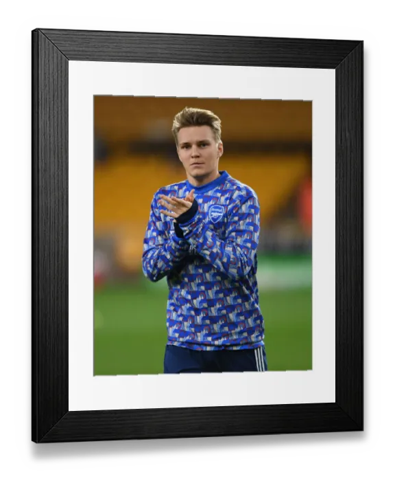 Framed Print : Martin Odegaard Gears Up: Wolverhampton Wanderers vs Arsenal, Premier League 2021-22