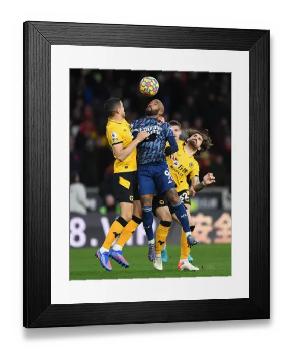 Framed Print : Clash at Molineux: Lacazette Faces Off Against Coady and Neves in Intense Wolverhampton Wanderers vs. Arsenal Premier League Showdown
