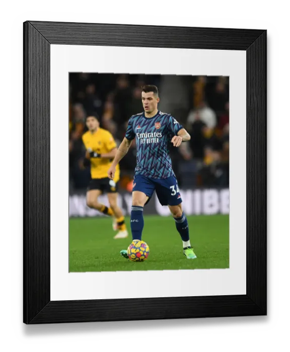 Framed Print : Granit Xhaka's Brilliant Midfield Performance: Arsenal Triumph Over Wolverhampton Wanderers Framed Print : Granit Xhaka's Brilliant Midfield Performance: Arsenal Triumph Over Wolverhampton Wanderers