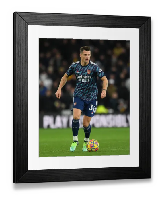 Framed Print : Granit Xhaka: Arsenal's Brilliant Midfield Performance Against Wolverhampton Wanderers, Premier League 2021-22