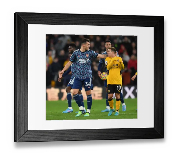 Framed Print : Xhaka vs. Podence: Clash of the Midfielders - Wolverhampton Wanderers vs. Arsenal, Premier League 2021-22