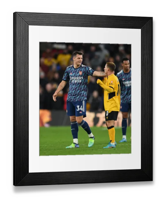 Framed Print : Clash of the Midfield Maestros: Xhaka vs. Podence - Wolverhampton Wanderers vs. Arsenal, Premier League 2021-22