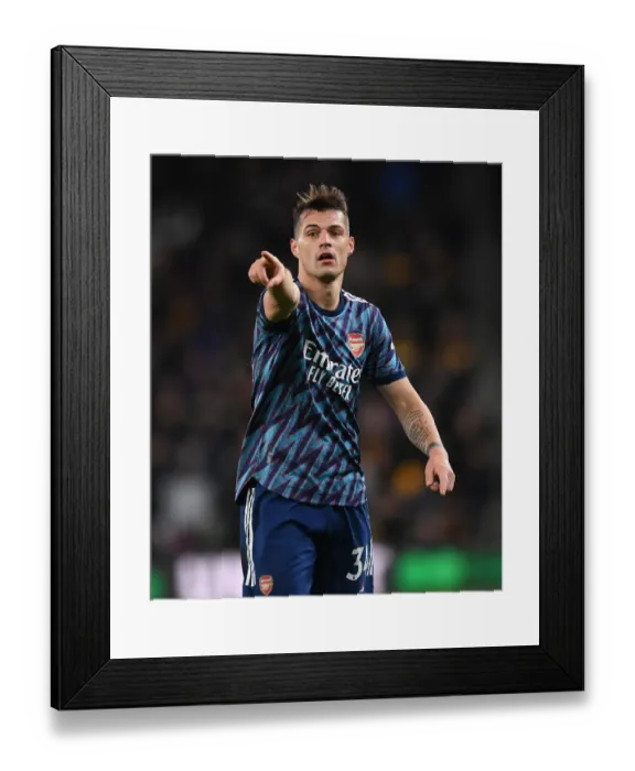 Framed Print : Granit Xhaka's Brilliant Midfield Performance: Arsenal Triumphs Over Wolverhampton Wanderers Framed Print : Granit Xhaka's Brilliant Midfield Performance: Arsenal Triumphs Over Wolverhampton Wanderers