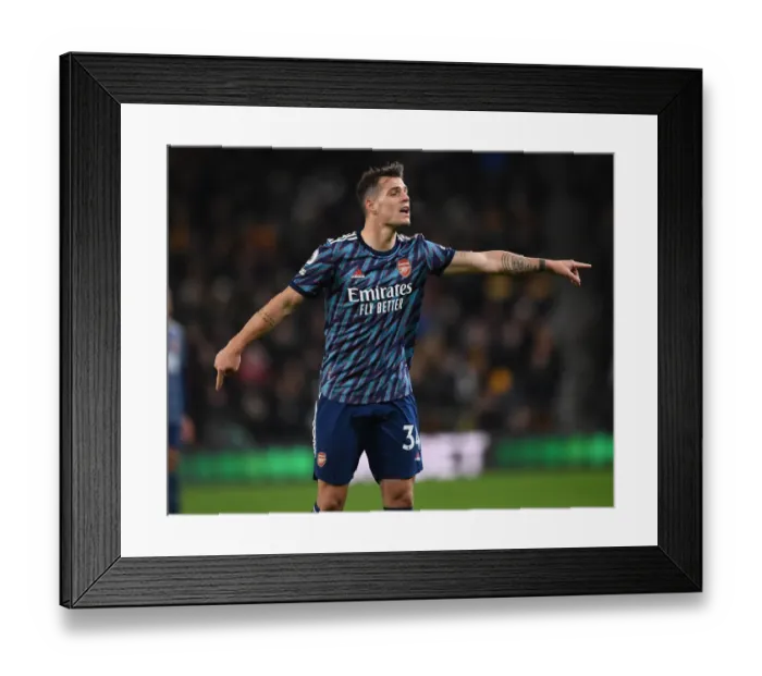 Framed Print : Granit Xhaka: Arsenal's Midfield Maestro Shines in Premier League Clash vs. Wolverhampton Wanderers Framed Print : Granit Xhaka: Arsenal's Midfield Maestro Shines in Premier League Clash vs. Wolverhampton Wanderers