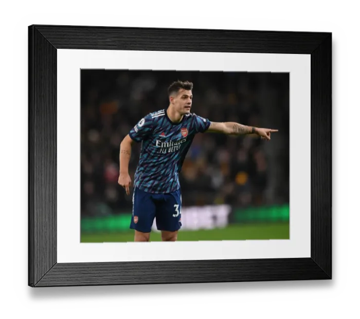 Framed Print : Granit Xhaka's Brilliant Midfield Performance: Arsenal Triumph Over Wolverhampton Wanderers in the Premier League Framed Print : Granit Xhaka's Brilliant Midfield Performance: Arsenal Triumph Over Wolverhampton Wanderers in the Premier League