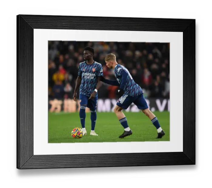 Framed Print : Bukayo Saka in Action: Wolverhampton Wanderers vs Arsenal, Premier League 2021-22 Framed Print : Bukayo Saka in Action: Wolverhampton Wanderers vs Arsenal, Premier League 2021-22