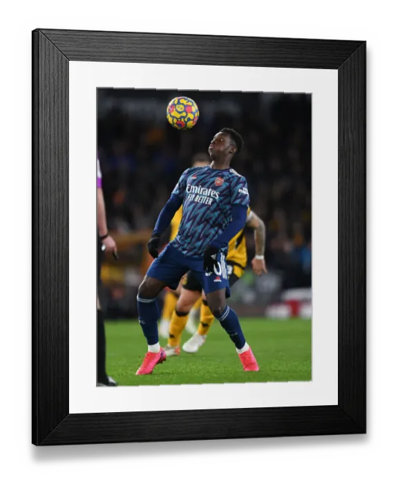 Framed Print : Arsenal's Eddie Nketiah Goes Head-to-Head with Wolverhampton Wanderers in Premier League Battle