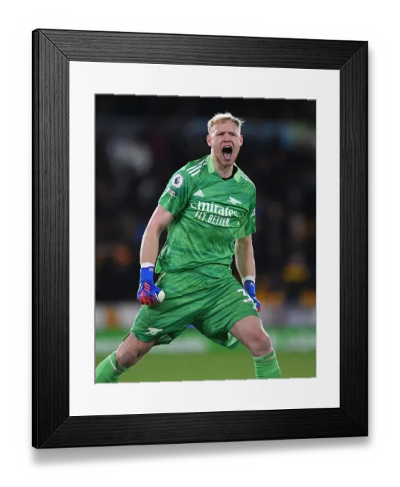 Framed Print : Arsenal's Aaron Ramsdale: Celebrating Victory over Wolverhampton Wanderers in the Premier League