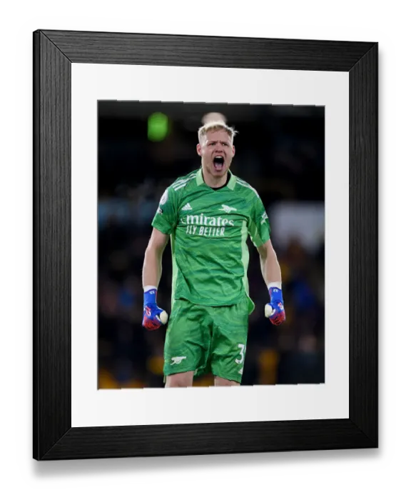 Framed Print : Arsenal's Aaron Ramsdale Celebrates Win Against Wolverhampton Wanderers in Premier League