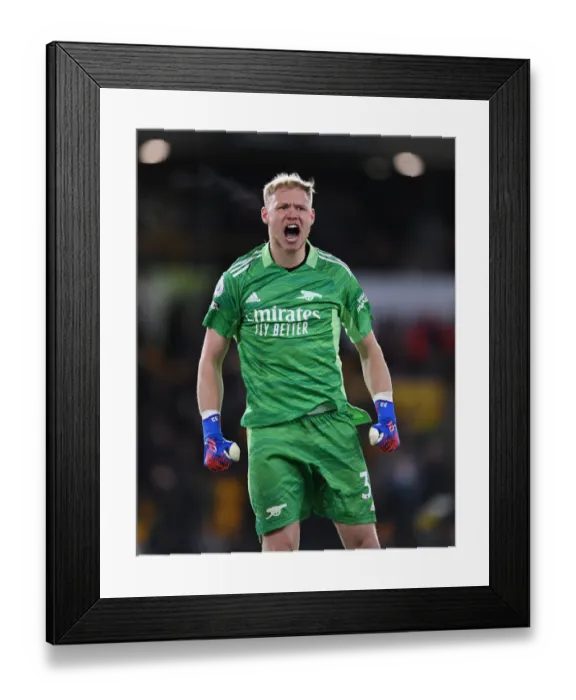 Framed Print : Arsenal's Aaron Ramsdale: Savoring Success Against Wolverhampton Wanderers in the Premier League