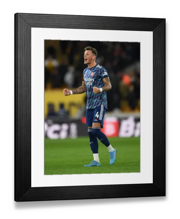 Framed Print : Ben White's Jubilant Moment: Arsenal's Triumph Over Wolverhampton Wanderers in Premier League