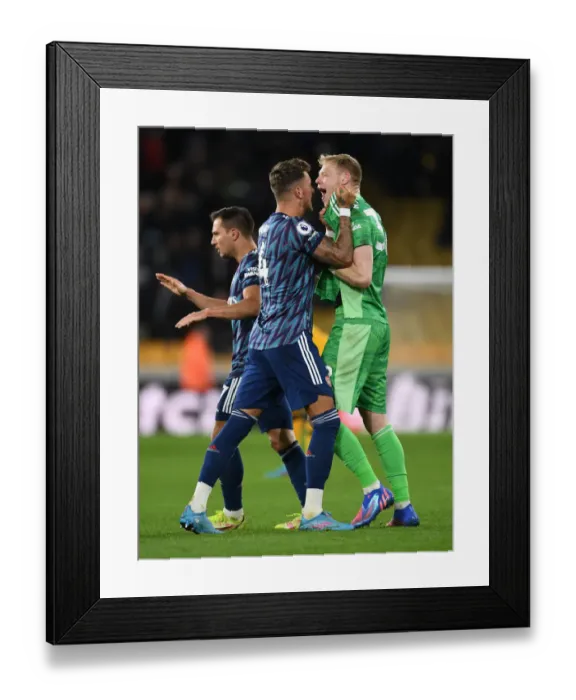 Framed Print : Arsenal's Ben White and Aaron Ramsdale Celebrate Victory over Wolverhampton Wanderers in Premier League