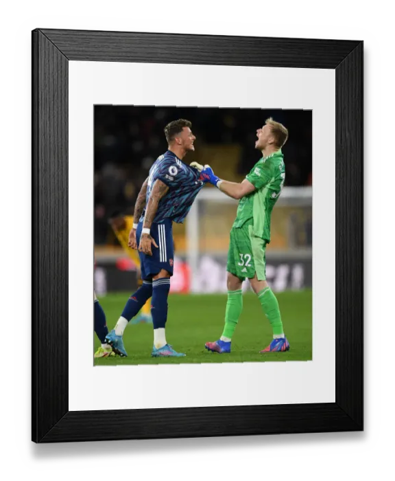 Framed Print : Arsenal's Ben White and Aaron Ramsdale: Celebrating a Hard-Fought Premier League Victory over Wolverhampton Wanderers Framed Print : Arsenal's Ben White and Aaron Ramsdale: Celebrating a Hard-Fought Premier League Victory over Wolverhampton Wanderers