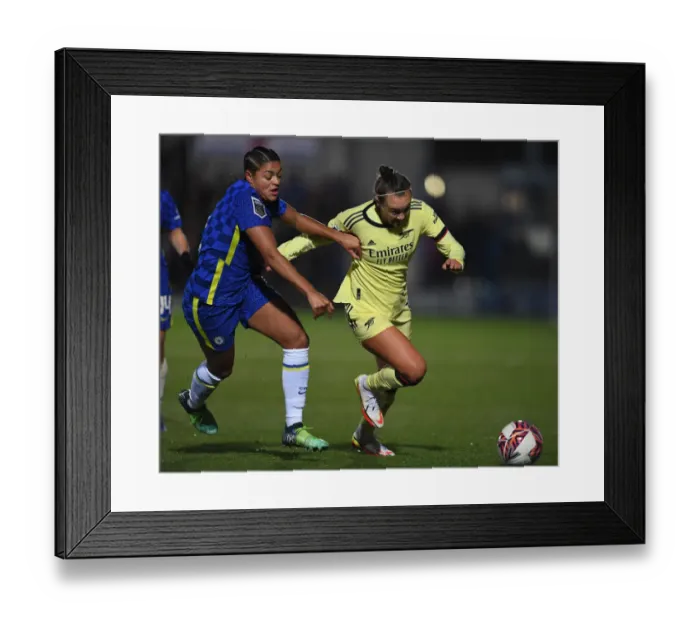 Framed Print : Caitlin Foord vs. Jess Carter: A Battle in the FA WSL Clash Between Chelsea Women and Arsenal Women