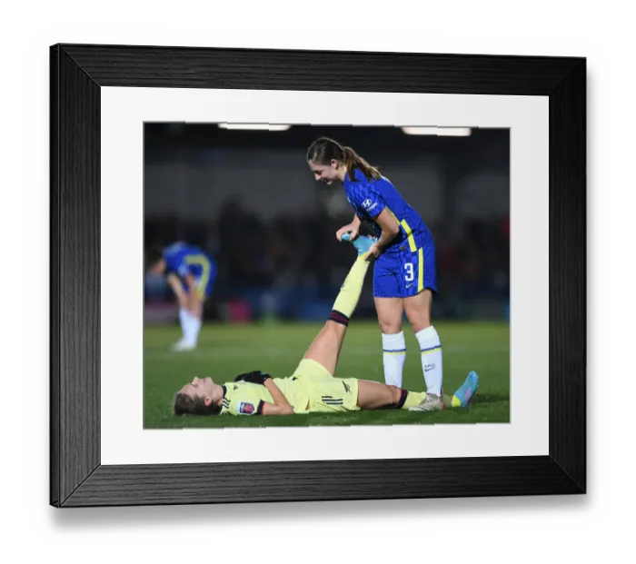 Framed Print : Vivianne Miedema Stretches Cramp in Intense Chelsea Women vs Arsenal Women FA WSL Clash