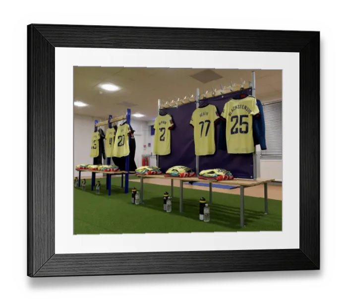 Framed Print : Arsenal Women: Gear Up for Chelsea Showdown in the Changing Room