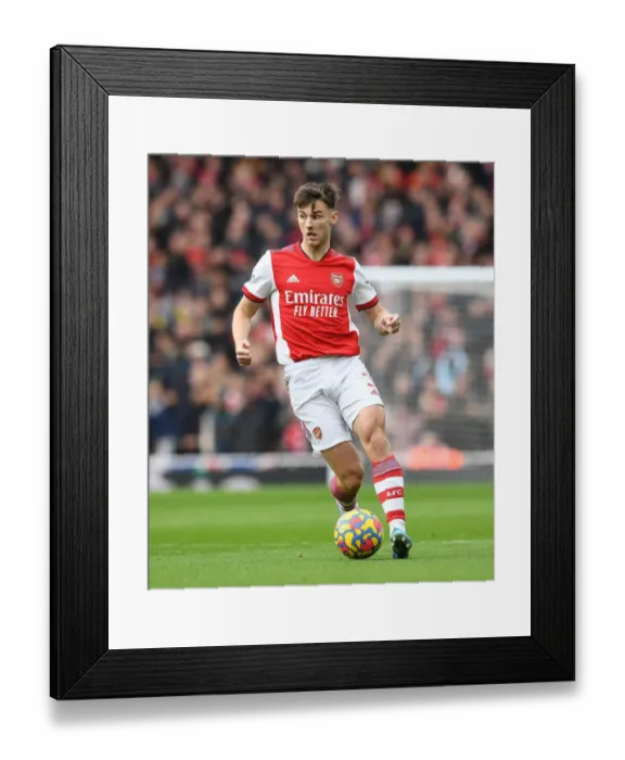 Framed Print : Arsenal's Kieran Tierney in Action Against Brentford in the Premier League Framed Print : Arsenal's Kieran Tierney in Action Against Brentford in the Premier League