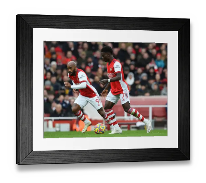 Framed Print : Arsenal's Lacazette and Saka in Action against Brentford, Premier League 2021-22 Framed Print : Arsenal's Lacazette and Saka in Action against Brentford, Premier League 2021-22