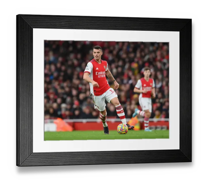 Framed Print : Granit Xhaka: Arsenal's Midfield Mastermind in Action against Brentford, Premier League 2021-22