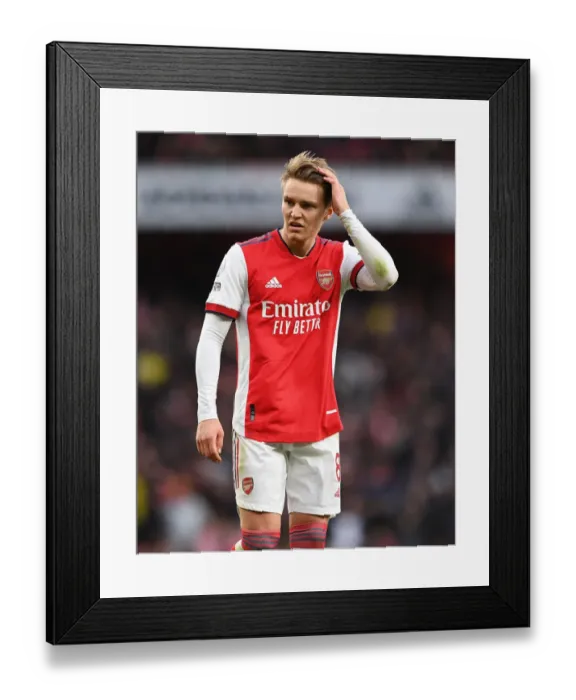 Framed Print : Martin Odegaard's Stellar Show: Arsenal's Victory Over Brentford in the Premier League Framed Print : Martin Odegaard's Stellar Show: Arsenal's Victory Over Brentford in the Premier League