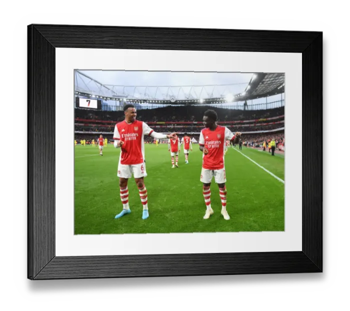 Framed Print : Arsenal's Saka and Gabriel Celebrate Second Goal Against Brentford (2021-22) Framed Print : Arsenal's Saka and Gabriel Celebrate Second Goal Against Brentford (2021-22)