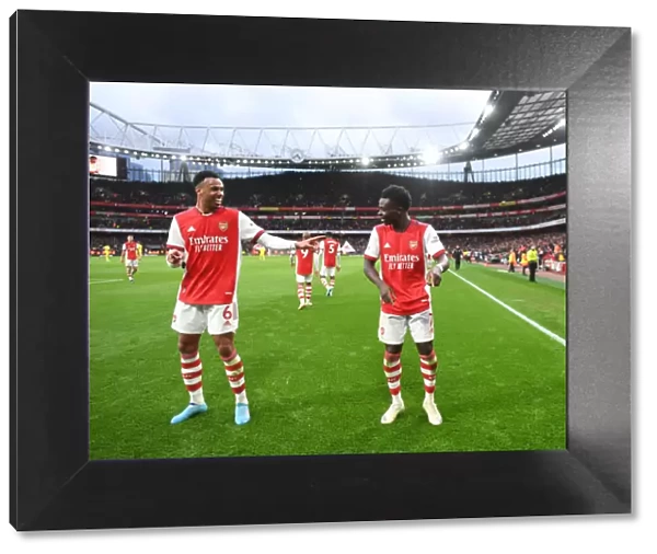 Arsenal's Saka and Gabriel Celebrate Second Goal Against Brentford, Premier League 2021-22